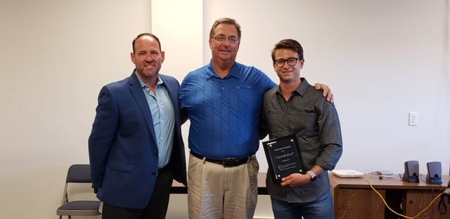 Dan Naumann presents Cody Milch and Jim Fair recognition of Laundrylux sponsorship support